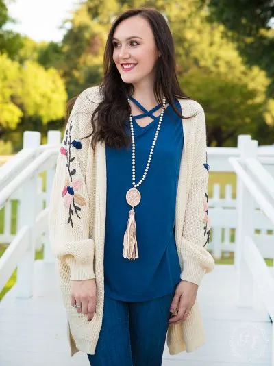 Thick knit cardigan with embroidered flower sleeves