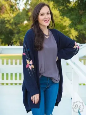 Thick knit cardigan with embroidered flower sleeves